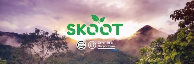 Skoot.eco logo against jungle background